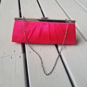 Pink satin clutch